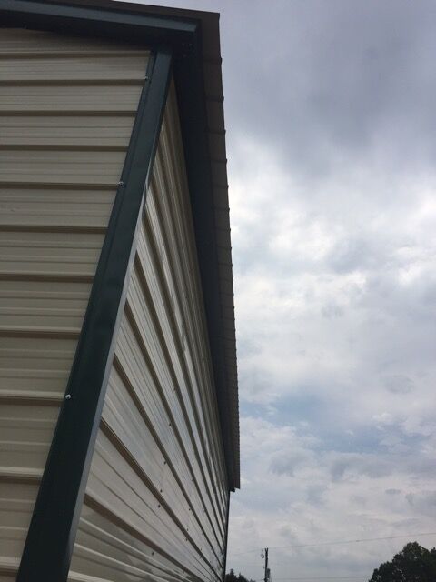 Side view of trim on a double wide commercial metal building.