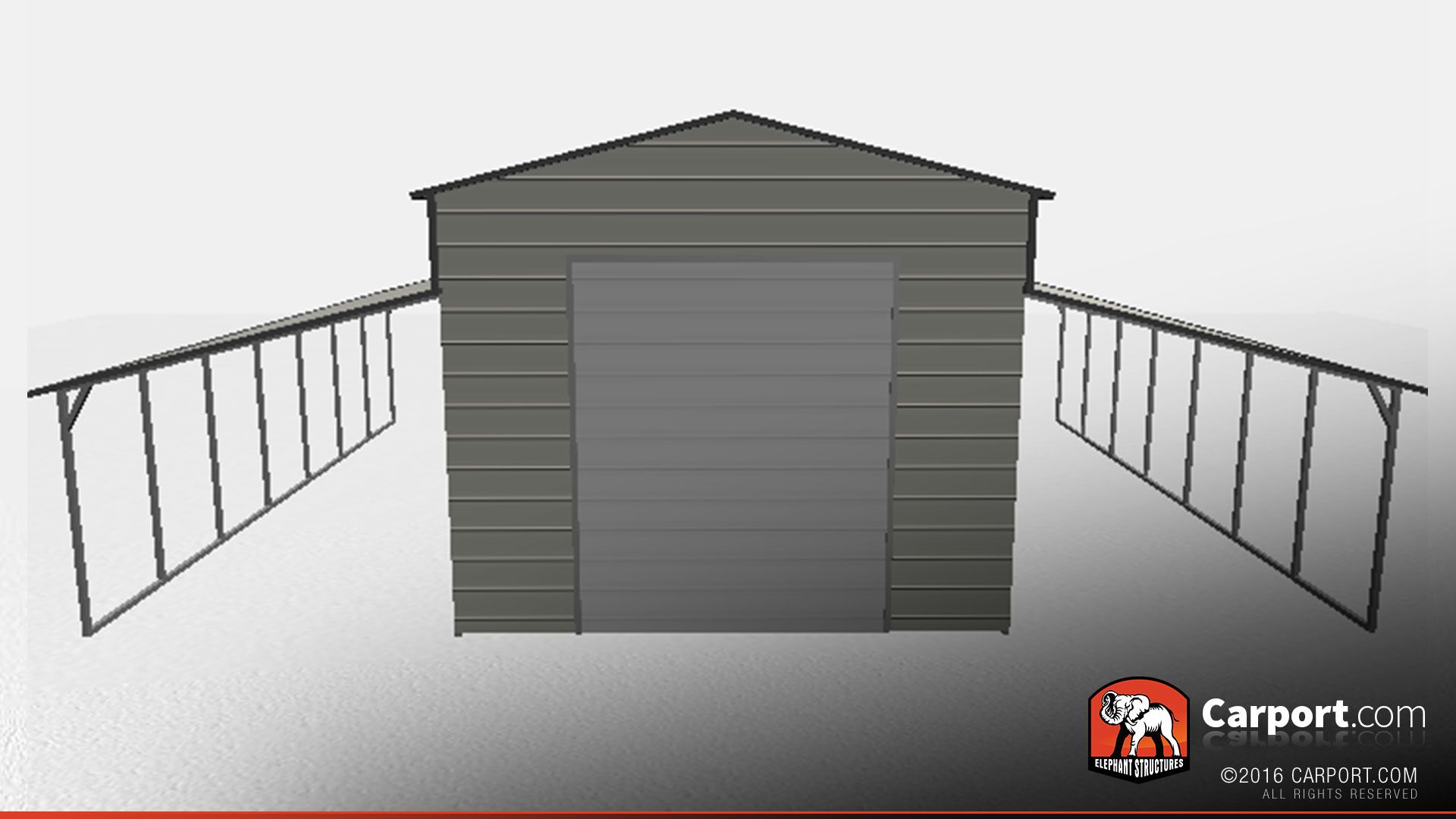 grey metal barn with two lean-tos on the side.